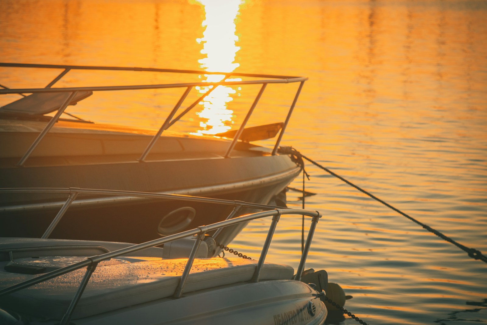 Small boats moored in clear Zakynthos water — private vs shared formats